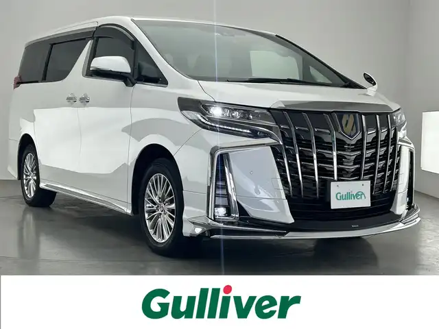 トヨタ アルファードハイブリット S タイプゴールドⅡ 愛知県 2022(令4)年 2.4万km ホワイトパールクリスタルシャイン 純正ディスプレイナビ　ＴＶ　ＤＶＤ　モデリスタエアロ　純正後席モニター　バックカメラ　ＡＣ１００Ｖ電源　電動リアゲート　両側パワースライドドア　三眼ＬＥＤライト　前後ドラレコ　ハーフレザー　トヨタセーフティセンス　衝突軽減　追従クルコン　車線逸脱警報