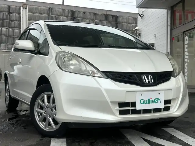 ホンダ フィット G スマートセレクション 愛知県 2011(平23)年 3.2万km プレミアムホワイトパール ワンオーナー/Ｈｏｎｄａ ＨＤＤインターナビシステム/バックカメラ/ワンセグTV・CD・DVD・AM・FM/Ｆパッケージ/●LEDドアミラーウインカー/●電動格納式リモコンカラードドアミラー/●高熱線吸収/UVカット機能付プライバシーガラス（リアドア/リアクォーター/テールゲート）/●運転席ハイトアジャスター（ラチェット式）/●アレルフリー高性能脱臭フィルター/コンフォートビューパッケージ/●親水/ヒーテッドドアミラー/●フロントドア撥水ガラス/●熱線入りフロントウインドウ/Modulo15インチAW/Ｈｏｎｄａスマートキーシステム/ハロゲンヘッドライト/電動格納ミラー/純正フロアマット/純正ドアバイザー/ＩＳＯＦＩＸ/スペアキー/取扱説明書/保証書/ディーラー点検整備記録簿1ヵ月・6ヵ月・H24-R6