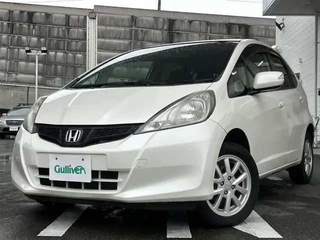 ホンダ フィット G スマートセレクション 愛知県 2011(平23)年 3.2万km プレミアムホワイトパール ワンオーナー/Ｈｏｎｄａ ＨＤＤインターナビシステム/バックカメラ/ワンセグTV・CD・DVD・AM・FM/Ｆパッケージ/●LEDドアミラーウインカー/●電動格納式リモコンカラードドアミラー/●高熱線吸収/UVカット機能付プライバシーガラス（リアドア/リアクォーター/テールゲート）/●運転席ハイトアジャスター（ラチェット式）/●アレルフリー高性能脱臭フィルター/コンフォートビューパッケージ/●親水/ヒーテッドドアミラー/●フロントドア撥水ガラス/●熱線入りフロントウインドウ/Modulo15インチAW/Ｈｏｎｄａスマートキーシステム/ハロゲンヘッドライト/電動格納ミラー/純正フロアマット/純正ドアバイザー/ＩＳＯＦＩＸ/スペアキー/取扱説明書/保証書/ディーラー点検整備記録簿1ヵ月・6ヵ月・H24-R6