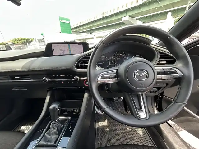 マツダ マツダ３ファストバック 20S プロアクティブ ツーリングS 愛知県 2020(令2)年 6.7万km マシーングレープレミアムM メーカーナビ（AM/FM/フルセグ/BT/CD/DVD）/ETC/全方位カメラ/i-ACTIVSENSE/・スマートブレーキサポート/・車線逸脱警報システム/・ブラインドスポットモニター/・レーンキープアシスト/・道路標識警報/・パーキングセンサー/レーダークルーズコントロール/ヘッドアップディスプレイ/D席パワーシート/D席シートメモリー/純正前後ドライブレコーダー/ハンドルヒーター/MTモード付AT/革巻きステアリング/電格ミラー/純正アルミホイール/LEDヘッドライト/前後コーナーセンサー/スマートキー/スペアキー