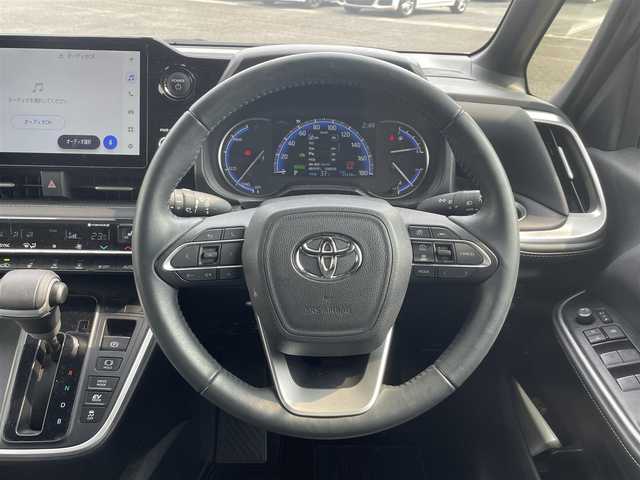 トヨタ ノア ハイブリッド S－Z 熊本県 2023(令5)年 1.2万km ホワイトパールクリスタルシャイン ワンオーナー車/保証書・取説有り/純正ディスプレイオーディオ/・CD/DVD/BT/フルセグ/ミラキャスト/ＨＤMI/バックカメラ/フリップダウンモニター/ETC2.0/両側パワースライドドア/LEDライト/ハーフレザーシート/モデリスタフルエアロ/トヨタセーフティセンス/・AHB/・LDA/・PDA/・PKSB/・RSA/電子パーキング/マット/スマートキー/スペアキー×1