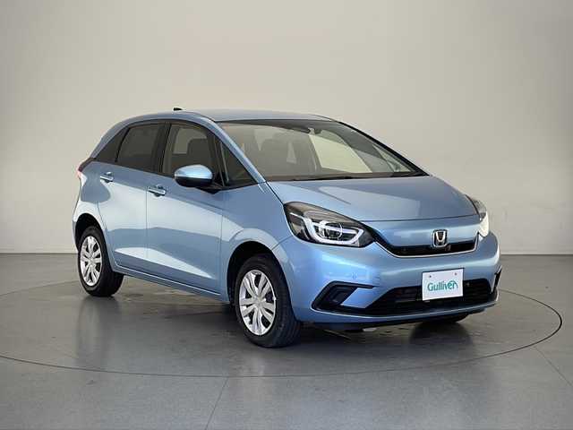 ホンダ フィット e:HEVホーム 長野県 2020(令2)年 0.7万km ライトブルー 4WD/純正SDナビ&CD&USB&BT/ホンダセンシング/アダプティブクルーズコントロール/路外逸脱警報/車線逸脱警報/衝突軽減ブレーキ/踏み間違い防止/標識認識機能/先行車発進告知/純正前後ドライブレコーダー/ハーフレザーシート/ステアリングスイッチ/バックカメラ/ビルトインETC/LEDヘッドライト/オートライト/電動格納ミラー/ウィンカーミラー/電動ホールド/ブレーキホールド/純正ホイールキャップ装着/純正フロアマット/プッシュスタート/スマートキー