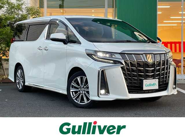 トヨタ アルファード S タイプゴールドⅢ 岡山県 2022(令4)年 2.4万km ホワイトパールクリスタルシャイン 純正8インチディスプレイオーディオ/AM、FM、AppleCarplay、AndroidAuto/バックカメラ/ビルトインETC2.0/前後ドライブレコーダー　TZ-DR210/コーナーセンサー/パワーバックドア/ハーフレザーシート/オットマン/トヨタセーフティセンス/・レーントレーシングアシスト/・クリアランスソナー/・パーキングサポートブレーキ/・プリクラッシュセーフティ/・ブラインドスポットモニター/・リアクロストラフィックアラート/・ロードサインアシスト