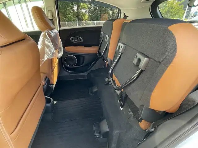 ホンダ ヴェゼル ハイブリッド Z ホンダセンシング 大阪府 2018(平30)年 4.1万km プラチナホワイトパール ワンオーナー　/純正８インチナビ　/   フルセグＴＶ/CD/DVD/Bluetooth/USB　/バックモニター　/衝突軽減ブレーキ　/前席シートヒーター　/レーダークルーズコントロール/レーンキープアシスト　/アイドリングストップ　/ハーフレザーシート/純正17インチアルミホイール　/スマートキー　/ビルトインＥＴＣ　/ＬＥＤライト