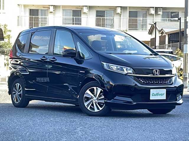 ホンダ フリード＋ ハイブリット G ホンダセンシング 大阪府 2022(令4)年 3.8万km クリスタルブラックパール 純正ナビ/（CD/DVD/Bluetooth）/フルセグTV/バックカメラ/ETC/両側パワースライドドア/純正１５インチAW/ハーフレザーシート/前席シートヒーター/革巻きステアリング/ステアリングリモコン/純正マット/保証書/取扱説明書