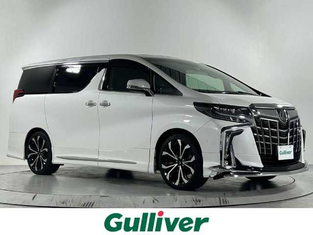 トヨタ アルファード S Cパッケージ 佐賀県 2021(令3)年 2.4万km ホワイトパールクリスタルシャイン 純正ナビナビ機能付き/（AM FM CD DVD USB BT )/JBLサウンド　/モデリスタエアロ　/モデリスタ20インチアルミ/フリップダウン　/サンルーフ　/全方位カメラ　/デジタルインナーミラー　/前後ドラレコ　/レーンキープ　/横滑り防止　/プリクラッシュセーフティー/パーキングアシスト　/クルコン　/両側パワスラ/パワーバックドア/レザーシート/シートヒーター/パワーシート/シートメモリー/ハンドルヒーター/純正フロアマット