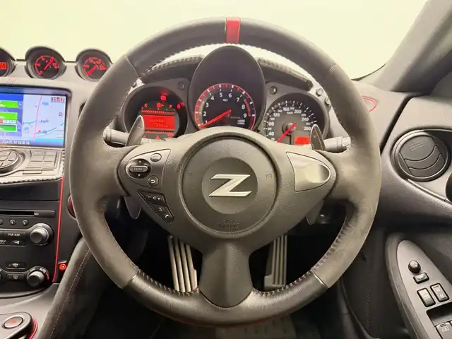 日産 フェアレディ Ｚ ニスモ 兵庫県 2018(平30)年 2.9万km ブリリアントホワイトパール 純正HDDナビ/フルセグ CD DVD BT MSV AUX/純正RECAROシート/ハーフレザーシート/BOSEサウンド/バックカメラ/ドライブレコーダー/ビルトインETC/パドルシフト/HIDヘッドライト/オートライト/オーリンズ車高調/ニスモマフラー/ニスモコンピューター/純正19インチアルミホイール/スマートキー/スペアキー/取扱い説明書/新車時保証書