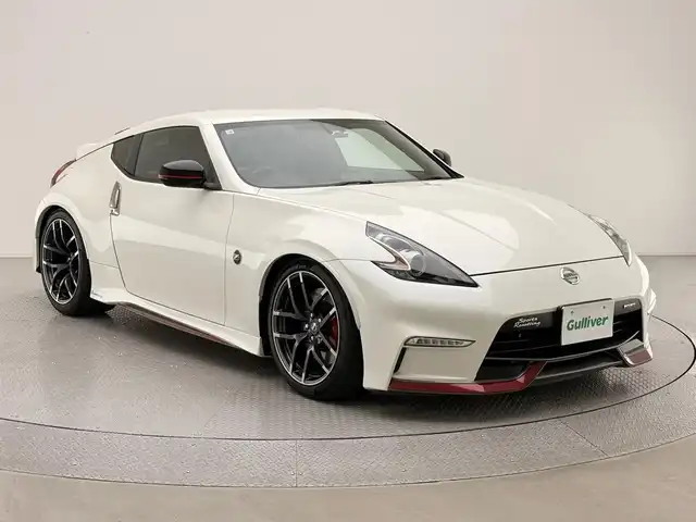 日産 フェアレディ Ｚ ニスモ 兵庫県 2018(平30)年 2.9万km ブリリアントホワイトパール 純正HDDナビ/フルセグ CD DVD BT MSV AUX/純正RECAROシート/ハーフレザーシート/BOSEサウンド/バックカメラ/ドライブレコーダー/ビルトインETC/パドルシフト/HIDヘッドライト/オートライト/オーリンズ車高調/ニスモマフラー/ニスモコンピューター/純正19インチアルミホイール/スマートキー/スペアキー/取扱い説明書/新車時保証書