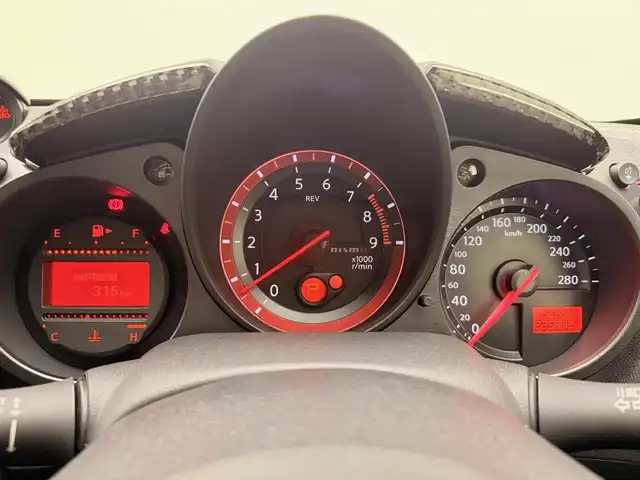 日産 フェアレディ Ｚ ニスモ 兵庫県 2018(平30)年 2.9万km ブリリアントホワイトパール 純正HDDナビ/フルセグ CD DVD BT MSV AUX/純正RECAROシート/ハーフレザーシート/BOSEサウンド/バックカメラ/ドライブレコーダー/ビルトインETC/パドルシフト/HIDヘッドライト/オートライト/オーリンズ車高調/ニスモマフラー/ニスモコンピューター/純正19インチアルミホイール/スマートキー/スペアキー/取扱い説明書/新車時保証書