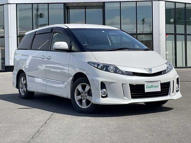 トヨタ エスティマ アエラス プレミアムエディション 青森県 2016(平28)年 3.7万km ホワイトパールクリスタルシャイン ・4WD/・純正ナビ（NSZA-X64T）/・フルセグ/・CD/DVD/SD/Bluetooth/・バックカメラ/・プッシュスタート/・スマートキー/・スペアキー1本/・横滑り防止/・オートライト/・MTモード付AT/・クルーズコントロール/・ビルドインETC/・パワーシート（D席）/・オットマン/・両側パワースライドドア/・純正フロアマット/・純正AW16インチ/・ドアバイザー/・冬タイヤAWセット積込み