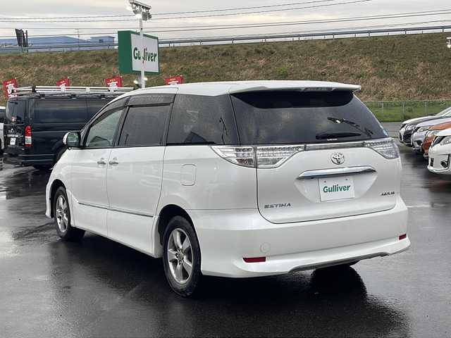 トヨタ エスティマ アエラス プレミアムエディション 青森県 2016(平28)年 3.7万km ホワイトパールクリスタルシャイン ・4WD/・純正ナビ（NSZA-X64T）/・フルセグ/・CD/DVD/SD/Bluetooth/・バックカメラ/・プッシュスタート/・スマートキー/・スペアキー1本/・横滑り防止/・オートライト/・MTモード付AT/・クルーズコントロール/・ビルドインETC/・パワーシート（D席）/・オットマン/・両側パワースライドドア/・純正フロアマット/・純正AW16インチ/・ドアバイザー/・スタットレスタイヤAWセット積み込み