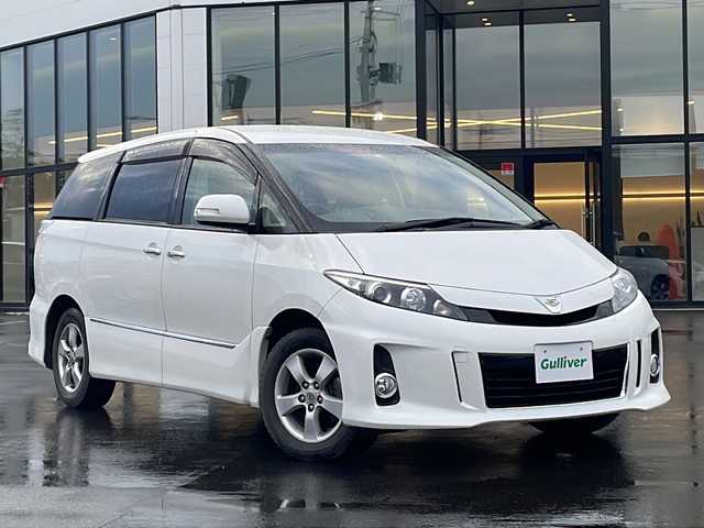 トヨタ エスティマ アエラス プレミアムエディション 青森県 2016(平28)年 3.7万km ホワイトパールクリスタルシャイン ・4WD/・純正ナビ（NSZA-X64T）/・フルセグ/・CD/DVD/SD/Bluetooth/・バックカメラ/・プッシュスタート/・スマートキー/・スペアキー1本/・横滑り防止/・オートライト/・MTモード付AT/・クルーズコントロール/・ビルドインETC/・パワーシート（D席）/・オットマン/・両側パワースライドドア/・純正フロアマット/・純正AW16インチ/・ドアバイザー/・スタットレスタイヤAWセット積み込み