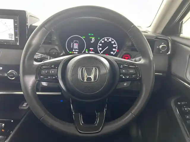 ホンダ ヴェゼル ハイブリッド e:HEV Z 佐賀県 2023(令5)年 0.6万km クリスタルブラックパール 純正7インチGathersナビ【VXM-235Ci】/【DVD.CD.Bluetooth】/バックカメラ/衝突被害軽減システム/レーダークルーズコントロール/レーンアシスト/ブラインドスポットモニター/先行車発進お知らせ機能/ロードサインアシスト/クリアランスソナー/オートライト/オートマチックハイビーム/ダウンヒルアシストコントロール/オートワイパー/ブレーキホールド/前後ドライブレコーダー/パワーバックドア/ステアリングヒーター/ハーフレザーシート/ETC/シーケンシャルウィンカー/LEDヘッドライト/フォグライト/ISOFIX対応シート/スマートキー/スペアキー×1/パドルシフト