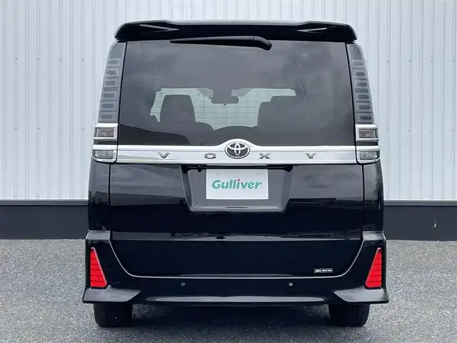 トヨタ ヴォクシー ZS 煌Ⅲ 千葉県 2021(令3)年 2.4万km ブラック 純正9インチナビ/(フルセグTV/BT/CD/DVD/FM/AM)/バックカメラ/衝突被害軽減システム/車線逸脱警報/クルーズコントロール/ハーフレザーシート/両側パワースライドドア/横滑り防止装置/ビルトインETC/アイドリングストップ/LEDヘッドライト/フォグランプ/オートライト/ウィンカーミラー/電動格納ミラー/純正16インチAW/シートリフター/プッシュスタート/スマートキー/フロアマット/ドアバイザー/保証書/取扱説明書