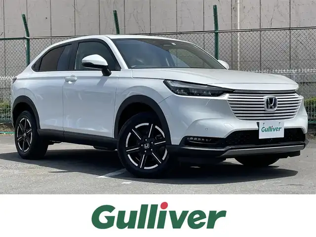 ホンダ ヴェゼル ハイブリッド e:HEV X 東京都 2022(令4)年 3.5万km プラチナホワイトパール 純正ナビ/バックモニター/衝突被害軽減/路外逸脱抑制/アダプティブクルーズコントロール/ソナー/ＥＴＣ/ステアリングスイッチ/横滑り防止措置/ヒルディセントコントロール/電子制御パーキングブレーキ