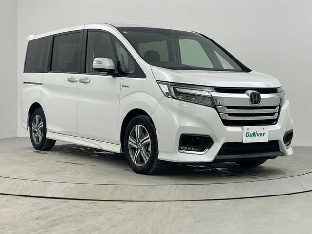 ホンダ ステップワゴン スパーダ ハイブリッド G EX ホンダセンシング 熊本県 2018(平30)年 3.8万km プラチナホワイトパール 純正9インチメモリーナビ/ CD DVD MSV BTオーディオ フルセグTV/全方位カメラ/両側パワースライドドア/レーダークルーズコントロール/社外フリップダウンモニター/ステアリングリモコン/前席シートヒーター/ドライブレコーダー/デジタルインナーミラー/LEDヘッドライト/ビルトインETC