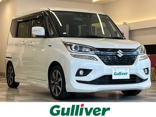 スズキ ソリオ バンディット HV SV 岐阜県 2021(令3)年 4.2万km ピュアホワイトP 純正SDナビゲーション/フルセグテレビ/Bluetooth/CD/DVD/USB/iPod/VTR/アダプティブクルーズコントロール/パドルシフト/両側パワースライドドア/前ドライブレコーダー/社外スタッドレスアルミホイールタイヤ積込/LEDヘッドライト/D＋N席シートヒーター/オートマチックハイビーム/オートライト/横滑り防止装置/パーキングアシスト/レーンキープアシスト/盗難防止システム/プッシュスタート/スペアキー
