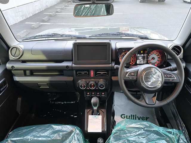 スズキ ジムニー ノマド FC 栃木県 2025(令7)年 0.1千km ＤグリーンⅡ ワンオーナー/SUZUKI Safety Support/・デュアルカメラブレーキサポート/・誤発進抑制機能/・後退時ブレーキサポート/・後方誤発進抑制機能/・車線逸脱警告機能/・ふらつき警報機能/・ハイビームアシスト/・先行車発進お知らせ機能/・アダプティブクルーズコントロール/ヒルホールドコントロール/ヒルディセントコントロール/シートヒーター/LEDヘッドランプ/15インチアルミホイール/ジャングルグリーン2(WA7)