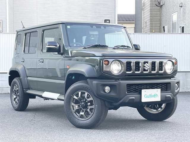 スズキ ジムニー ノマド FC 栃木県 2025(令7)年 0.1千km ＤグリーンⅡ ワンオーナー/SUZUKI Safety Support/・デュアルカメラブレーキサポート/・誤発進抑制機能/・後退時ブレーキサポート/・後方誤発進抑制機能/・車線逸脱警告機能/・ふらつき警報機能/・ハイビームアシスト/・先行車発進お知らせ機能/・アダプティブクルーズコントロール/ヒルホールドコントロール/ヒルディセントコントロール/シートヒーター/LEDヘッドランプ/15インチアルミホイール/ジャングルグリーン2(WA7)