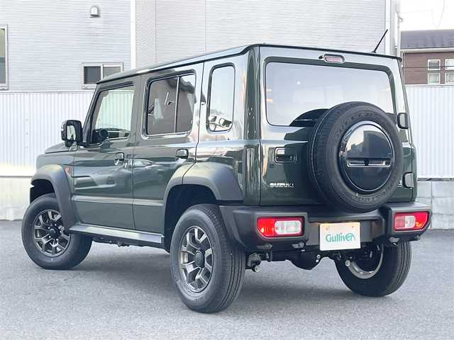 スズキ ジムニー ノマド FC 栃木県 2025(令7)年 0.1千km ＤグリーンⅡ ワンオーナー/SUZUKI Safety Support/・デュアルカメラブレーキサポート/・誤発進抑制機能/・後退時ブレーキサポート/・後方誤発進抑制機能/・車線逸脱警告機能/・ふらつき警報機能/・ハイビームアシスト/・先行車発進お知らせ機能/・アダプティブクルーズコントロール/ヒルホールドコントロール/ヒルディセントコントロール/シートヒーター/LEDヘッドランプ/15インチアルミホイール/ジャングルグリーン2(WA7)