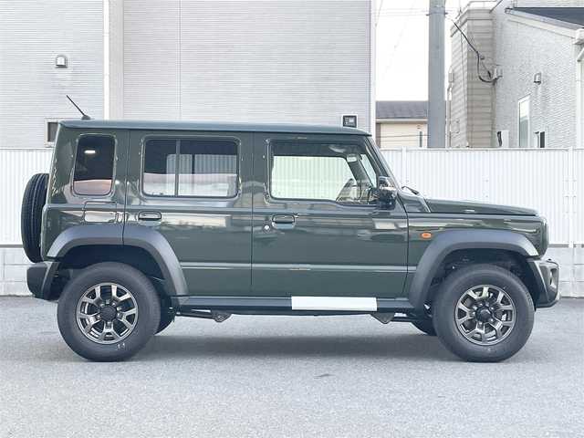 スズキ ジムニー ノマド FC 栃木県 2025(令7)年 0.1千km ＤグリーンⅡ ワンオーナー/SUZUKI Safety Support/・デュアルカメラブレーキサポート/・誤発進抑制機能/・後退時ブレーキサポート/・後方誤発進抑制機能/・車線逸脱警告機能/・ふらつき警報機能/・ハイビームアシスト/・先行車発進お知らせ機能/・アダプティブクルーズコントロール/ヒルホールドコントロール/ヒルディセントコントロール/シートヒーター/LEDヘッドランプ/15インチアルミホイール/ジャングルグリーン2(WA7)