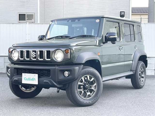 スズキ ジムニー ノマド FC 栃木県 2025(令7)年 0.1千km ＤグリーンⅡ ワンオーナー/SUZUKI Safety Support/・デュアルカメラブレーキサポート/・誤発進抑制機能/・後退時ブレーキサポート/・後方誤発進抑制機能/・車線逸脱警告機能/・ふらつき警報機能/・ハイビームアシスト/・先行車発進お知らせ機能/・アダプティブクルーズコントロール/ヒルホールドコントロール/ヒルディセントコントロール/シートヒーター/LEDヘッドランプ/15インチアルミホイール/ジャングルグリーン2(WA7)