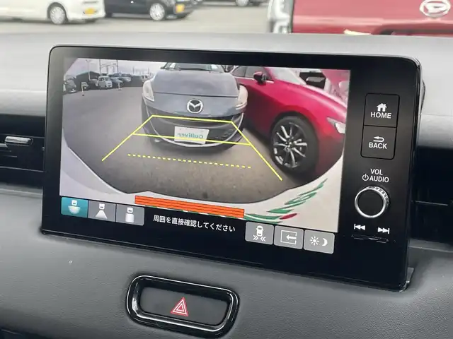 ホンダ ヴェゼル ハイブリッド e:HEV Z 滋賀県 2024(令6)年 1.6万km プラチナホワイトパール 純正9インチメモリナビ/【Bluetooth/USB/Apple Car Play/Android Auto/フルセグ 】/バックカメラ/ハーフレザー/シートヒーター/追従クルーズコントロール/前後ソナー/ホンダセンシング/パワーリアゲート/オートハイビーム/ステアリングヒーター/レーンキープアシスト/オートホールド/LEDヘッドライト/ビルトインETC2.0/純正18アルミ