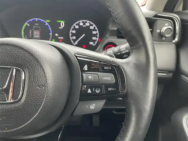 ホンダ ヴェゼル ハイブリッド e:HEV Z 滋賀県 2024(令6)年 1.6万km プラチナホワイトパール 純正9インチメモリナビ/【Bluetooth/USB/Apple Car Play/Android Auto/フルセグ 】/バックカメラ/ハーフレザー/シートヒーター/追従クルーズコントロール/前後ソナー/ホンダセンシング/パワーリアゲート/オートハイビーム/ステアリングヒーター/レーンキープアシスト/オートホールド/LEDヘッドライト/ビルトインETC2.0/純正18アルミ