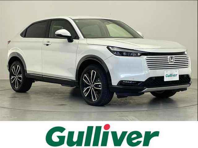 ホンダ ヴェゼル ハイブリッド e:HEV Z 愛知県 2024(令6)年 1.6万km プラチナホワイトパール 純正9インチメモリナビ/【Bluetooth/USB/Apple Car Play/Android Auto/フルセグ 】/バックカメラ/ハーフレザー/シートヒーター/追従クルーズコントロール/前後ソナー/ホンダセンシング/パワーリアゲート/オートハイビーム/ステアリングヒーター/レーンキープアシスト/オートホールド/LEDヘッドライト/ビルトインETC2.0/純正18アルミ