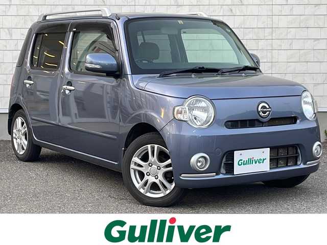 ダイハツ ミラ ココア プラスX 福島県 2010(平22)年 6.4万km チタニウムグレーメタリック ｃａｒｒｏｚｚｅｒｉａナビ　バックＣ　ＴＶ　ＤＶＤ再生機能　フォグランプ　ルーフレール　スマートキー　積込スタッドレス付純正ホイール４本　電動格納ミラー　フロアマット　スペアキー　ドアバイザー