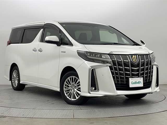 トヨタ アルファードハイブリット S タイプゴールド 新潟県 2021(令3)年 5.6万km ホワイトパールクリスタルシャイン 4WD/フリップダウンモニター/純正ナビ/　　フルセグ/CD/DVD/BT/バックカメラ/両側パワースライドドア/パワーバックドア/おしレーダークルーズコントロール/LEDオートライト/オートマチックハイビーム/ハーフレザーシート/純正17インチアルミホイール/ステアリングスイッチ/デジタルインナーミラー/ブラインドスポットモニター/スマートキー/ビルトインETC2.0