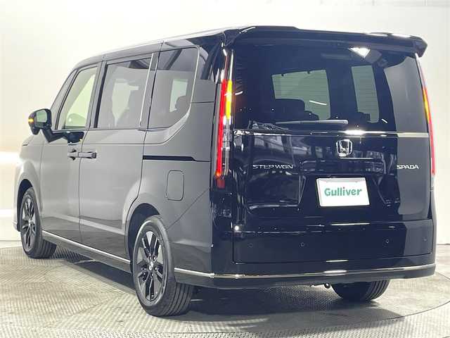 ホンダ ステップワゴン スパーダ 大阪府 2025(令7)年 0.1万km未満 クリスタルブラックパール 登録済未使用車 純正11.4incナビ(フルセグ/DVD再生/Bluetooth) バックカメラ 後席モニター ハーフレザー シートヒーター オットマン 電動リアゲート 衝突軽減 レーダーC BSM