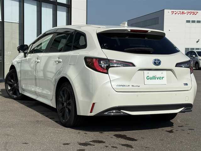 トヨタ カローラツーリング ハイブリッド ダブルバイビー 道南・函館 2020(令2)年 6.9万km ホワイトパールクリスタルシャイン ・スマートキー＆プッシュスタート/・純正ナビ（Ｂｌｕｅｔｏｏｔｈ／ＵＳＢ／ＴＶ）/・ビルトインＥＴＣ２．０/・前後ドラレコ/・バックカメラ/・ハーフレザーシート/・前席シートヒーター/・ハンドルヒーター/・純正１７ＡＷ/・純正フロアマット/・アイドリングストップ