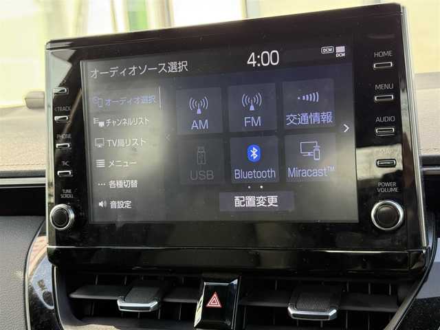 トヨタ カローラツーリング ハイブリッド ダブルバイビー 道南・函館 2020(令2)年 6.9万km ホワイトパールクリスタルシャイン ・スマートキー＆プッシュスタート/・純正ナビ（Ｂｌｕｅｔｏｏｔｈ／ＵＳＢ／ＴＶ）/・ビルトインＥＴＣ２．０/・前後ドラレコ/・バックカメラ/・ハーフレザーシート/・前席シートヒーター/・ハンドルヒーター/・純正１７ＡＷ/・純正フロアマット/・アイドリングストップ