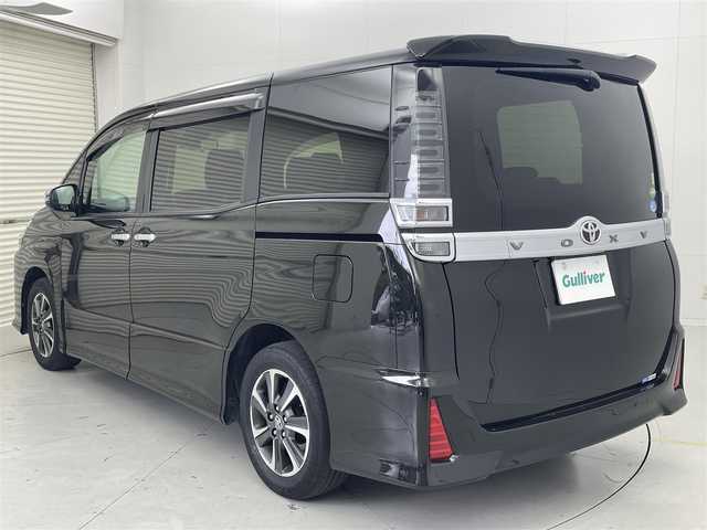 トヨタ ヴォクシー ZS 煌Ⅱ 茨城県 2019(令1)年 6.6万km イナズマスパーキングブラックガラスフレーク 純正10型ナビ/バックカメラ/フルセグ/純正フリップダウンモニター/衝突被害軽減ブレーキ/車線逸脱抑制装置/クルーズコントロール/オートマチックハイビーム/クリアランスソナー/両側電動スライドドア/ETC/ドラレコ/純正16インチAW/LEDヘッドライト/スマートキー