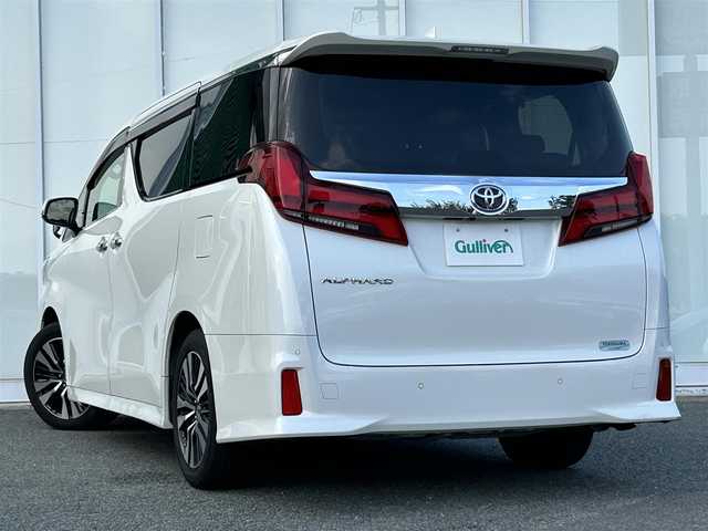 トヨタ アルファード S Cパッケージ 福岡県 2021(令3)年 4.7万km ホワイトパールクリスタルシャイン 純正メーカーオプションナビ/ツインムーンルーフ/12インチ後席モニター/デジタルインナーミラー/両側パワースライドドア/バックカメラ/前後ドライブレコーダー/ビルドインETC/クリアランスソナー/ブラインドスポットモニター/衝突被害軽減システム/横滑り防止装置/レーンキープアシスト/クルーズコントロール/LEDヘッドライト/フォグランプ/シーケンシャルターンランプ/D/N/後席パワーシート（D席メモリ機能有）/D/N席エアシート/ヒートステアリング/パワーバックドア/ステアリングスイッチ/オート電動格納ミラー/電動パーキングブレーキ/デュアルオートエアコン/純正サンシェード/ナノイー/ISOFIX