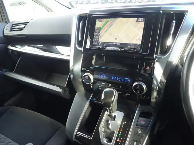 トヨタ ヴェルファイア Z 千葉県 2016(平28)年 5.7万km ブラック 両側パワースライドドア/社外SDナビ/地デジTV/【DVD/CD再生機能　Bluetooth接続】/バックカメラ/フリップダウンモニター/革巻きステアリング/ETC/LEDヘッドライト/フォグライト/ウインカーミラー/クリアランスソナー/純正18インチアルミホイル/サイド/カーテンエアバッグ/スマートキー