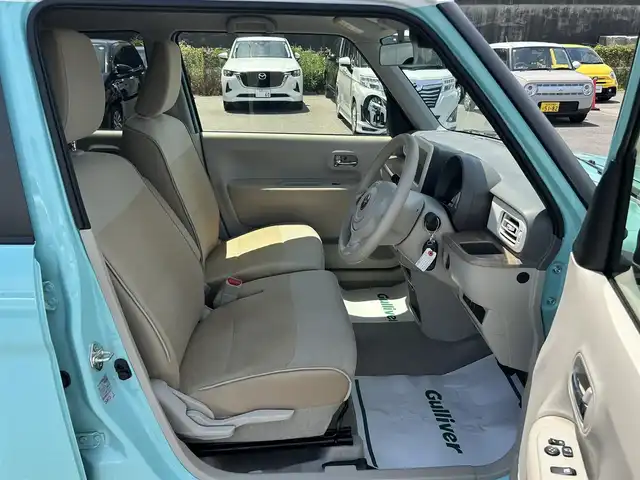 スズキ ラパン X 山形県 2022(令4)年 0.4万km フレンチミントパールメタリック 4WD/スズキセーフティサポート/HIDオートヘッドライト/シートヒーター/純正14インチアルミホイール/アイドリングストップ/コーナーセンサー/ステアリングスイッチ/革巻きステアリング/電動格納ウィンカーミラー/ミラーヒーター/スマートキー×2