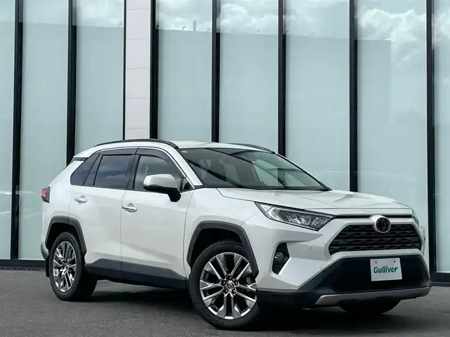 トヨタ ＲＡＶ４ G Zパッケージ 大阪府 2019(令1)年 7.1万km ホワイトパールクリスタルシャイン 純正９インチナビ　/   フルセグＴＶ/Bluetooth/USB　/衝突軽減ブレーキ　/クリアランスソナー/バックモニター　/ブラインドスポットモニター/デジタルインナーモニター　/レーダークルーズコントロール/レーンキープアシスト/オートマチックハイビーム/電動リアゲート　/運転席メモリー付きパワーシート　/前方ドライブレコーダー　/純正19インチアルミホイール/ルーフレール/プッシュスタート/スマートキー　/ＥＴＣ　/ＬＥＤ