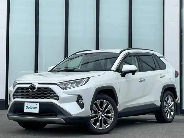 トヨタ ＲＡＶ４ G Zパッケージ 大阪府 2019(令1)年 7.1万km ホワイトパールクリスタルシャイン 純正９インチナビ　/   フルセグＴＶ/Bluetooth/USB　/衝突軽減ブレーキ　/クリアランスソナー/バックモニター　/ブラインドスポットモニター/デジタルインナーモニター　/レーダークルーズコントロール/レーンキープアシスト/オートマチックハイビーム/電動リアゲート　/運転席メモリー付きパワーシート　/前方ドライブレコーダー　/純正19インチアルミホイール/ルーフレール/プッシュスタート/スマートキー　/ＥＴＣ　/ＬＥＤ