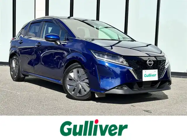 日産 ノート X 大阪府 2021(令3)年 4.6万km オーロラフレアブルーパール 純正ナビ/・Bluetooth/フルセグTV/CD/DVD/USB/　HDMI/ラジオ/主要装備/・エマージェンシーブレーキー/・ハイビームアシスト/・踏み間違い衝突防止アシスト/・レーンアシスト/・横滑り防止装置/・全方位カメラ/・BSM/・オートホールド/・バックドアロック解除スイッチ/・SOSコール/・置くだけ充電/・ステアリングリモコン/・コーナーセンサー/・LEDヘッドライト/・純正ホイールキャップ/・純正フロアマット/・ドライブレコーダー/・ETC2.0