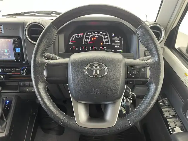 トヨタ ランドクルーザー AX 群馬県 2024(令6)年 0.9万km スーパーホワイトⅡ 純正７インチナビ/・フルセグTV/AM/FM/CD/DVD/BT/SD/－－－－－－－－－/純正ナビ　バックカメラ　クルーズコントロール　衝突軽減　ＪＡＯＳフリントバンパーガーニッシュ／フロントアンダーカバー／リアアンダーカバー　ドライブレコーダー　電動デフロック　ＥＴＣ　４ＷＤ　禁煙車