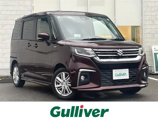 スズキ ソリオ HV MZ 宮崎県 2021(令3)年 7万km メロウディープレッドパール ワンオーナー/純正MOP9型ナビ/フルセグTV/両側パワースライドドア/全方位モニター/ビルトインETC/ドライブレコーダー/アダプティブクルーズコントロール/セーフティサポート/・衝突被害軽減ブレーキ/・後退時ブレーキサポート/・車線逸脱警報/・前後誤発進抑制/・ハイビームアシスト/・標識認識/・リアパーキングセンサー/LEDヘッドランプ/革巻きステアリング/ハンズフリーステアリングスイッチ/純正15インチアルミホイール/スマートキー/プッシュエンジンスタート/禁煙車