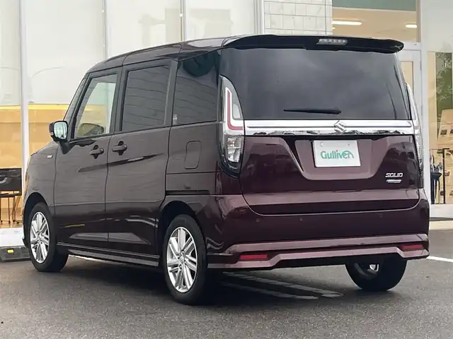 スズキ ソリオ HV MZ 宮崎県 2021(令3)年 7万km メロウディープレッドパール ワンオーナー/純正MOP9型ナビ/フルセグTV/両側パワースライドドア/全方位モニター/ビルトインETC/ドライブレコーダー/アダプティブクルーズコントロール/セーフティサポート/・衝突被害軽減ブレーキ/・後退時ブレーキサポート/・車線逸脱警報/・前後誤発進抑制/・ハイビームアシスト/・標識認識/・リアパーキングセンサー/LEDヘッドランプ/革巻きステアリング/ハンズフリーステアリングスイッチ/純正15インチアルミホイール/スマートキー/プッシュエンジンスタート/禁煙車