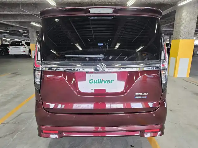 スズキ ソリオ HV MZ 宮崎県 2021(令3)年 7万km メロウディープレッドパール ワンオーナー/純正MOP9型ナビ/フルセグTV/両側パワースライドドア/全方位モニター/ビルトインETC/ドライブレコーダー/アダプティブクルーズコントロール/セーフティサポート/・衝突被害軽減ブレーキ/・後退時ブレーキサポート/・車線逸脱警報/・前後誤発進抑制/・ハイビームアシスト/・標識認識/・リアパーキングセンサー/LEDヘッドランプ/革巻きステアリング/ハンズフリーステアリングスイッチ/純正15インチアルミホイール/スマートキー/プッシュエンジンスタート/禁煙車