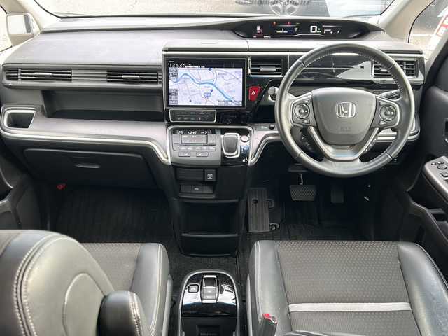 ホンダ ステップワゴン スパーダ eHEV G EXホンダS 福井県 2022(令4)年 5.9万km プラチナホワイトパール ナビ装着スペシャルパッケージ/＋ETC2.0車載機（ナビ連動）/ホンダセンシング/ターボ/純正10インチメモリナビゲーション/（CD/DVD/BT）/フルセグテレビ/バックカメラ/アダプティブクルーズコントロール/レーンキープアシスト/わくわくゲート/LEDヘッドライト/LEDフォグランプ/ドライブレコーダー（前後）/ハーフレザーシート/純正16インチアルミホイール/両側電動スライドドア/前席シートヒーター/3列シート/ウォークスルー/ステアリングリモコン/オートリトラミラー/オートライト/スマートキー/プッシュスタート/保証書/取扱説明書