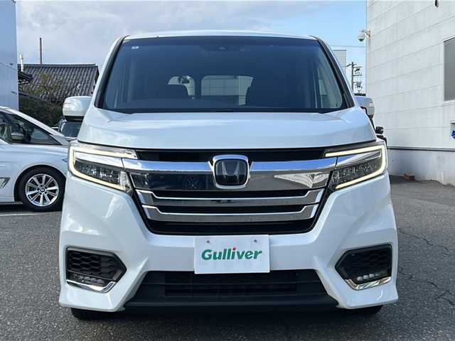 ホンダ ステップワゴン スパーダ eHEV G EXホンダS 福井県 2022(令4)年 5.9万km プラチナホワイトパール ナビ装着スペシャルパッケージ/＋ETC2.0車載機（ナビ連動）/ホンダセンシング/ターボ/純正10インチメモリナビゲーション/（CD/DVD/BT）/フルセグテレビ/バックカメラ/アダプティブクルーズコントロール/レーンキープアシスト/わくわくゲート/LEDヘッドライト/LEDフォグランプ/ドライブレコーダー（前後）/ハーフレザーシート/純正16インチアルミホイール/両側電動スライドドア/前席シートヒーター/3列シート/ウォークスルー/ステアリングリモコン/オートリトラミラー/オートライト/スマートキー/プッシュスタート/保証書/取扱説明書