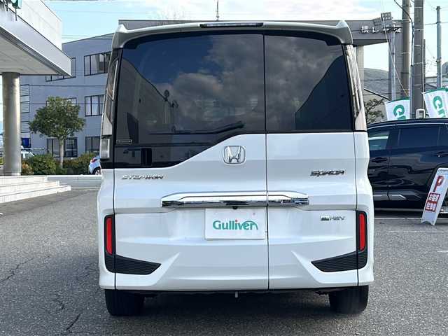 ホンダ ステップワゴン スパーダ eHEV G EXホンダS 福井県 2022(令4)年 5.9万km プラチナホワイトパール ナビ装着スペシャルパッケージ/＋ETC2.0車載機（ナビ連動）/ホンダセンシング/ターボ/純正10インチメモリナビゲーション/（CD/DVD/BT）/フルセグテレビ/バックカメラ/アダプティブクルーズコントロール/レーンキープアシスト/わくわくゲート/LEDヘッドライト/LEDフォグランプ/ドライブレコーダー（前後）/ハーフレザーシート/純正16インチアルミホイール/両側電動スライドドア/前席シートヒーター/3列シート/ウォークスルー/ステアリングリモコン/オートリトラミラー/オートライト/スマートキー/プッシュスタート/保証書/取扱説明書