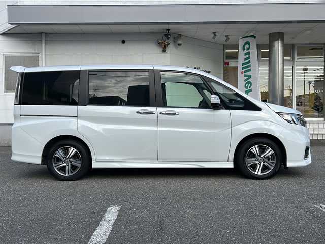 ホンダ ステップワゴン スパーダ eHEV G EXホンダS 福井県 2022(令4)年 5.9万km プラチナホワイトパール ナビ装着スペシャルパッケージ/＋ETC2.0車載機（ナビ連動）/ホンダセンシング/ターボ/純正10インチメモリナビゲーション/（CD/DVD/BT）/フルセグテレビ/バックカメラ/アダプティブクルーズコントロール/レーンキープアシスト/わくわくゲート/LEDヘッドライト/LEDフォグランプ/ドライブレコーダー（前後）/ハーフレザーシート/純正16インチアルミホイール/両側電動スライドドア/前席シートヒーター/3列シート/ウォークスルー/ステアリングリモコン/オートリトラミラー/オートライト/スマートキー/プッシュスタート/保証書/取扱説明書