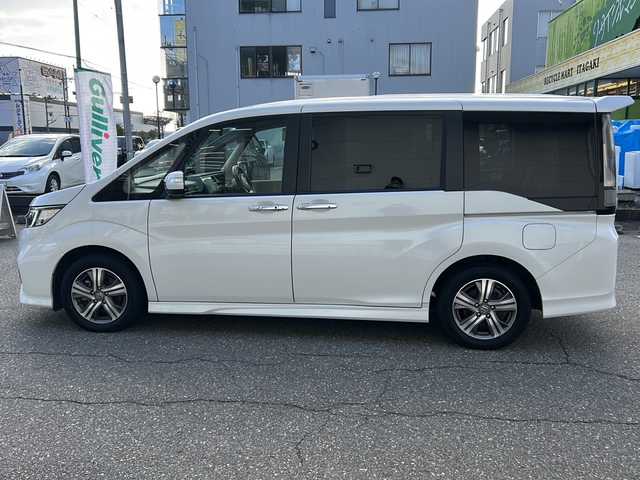 ホンダ ステップワゴン スパーダ eHEV G EXホンダS 福井県 2022(令4)年 5.9万km プラチナホワイトパール ナビ装着スペシャルパッケージ/＋ETC2.0車載機（ナビ連動）/ホンダセンシング/ターボ/純正10インチメモリナビゲーション/（CD/DVD/BT）/フルセグテレビ/バックカメラ/アダプティブクルーズコントロール/レーンキープアシスト/わくわくゲート/LEDヘッドライト/LEDフォグランプ/ドライブレコーダー（前後）/ハーフレザーシート/純正16インチアルミホイール/両側電動スライドドア/前席シートヒーター/3列シート/ウォークスルー/ステアリングリモコン/オートリトラミラー/オートライト/スマートキー/プッシュスタート/保証書/取扱説明書